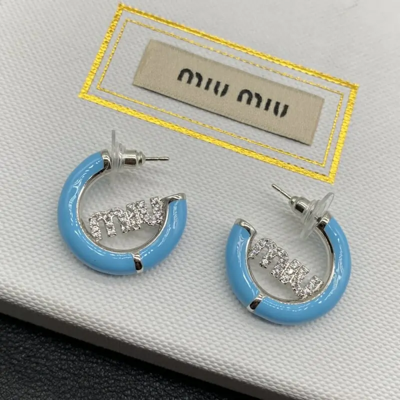 miu miu boucles doreilles pour femme s_1213036